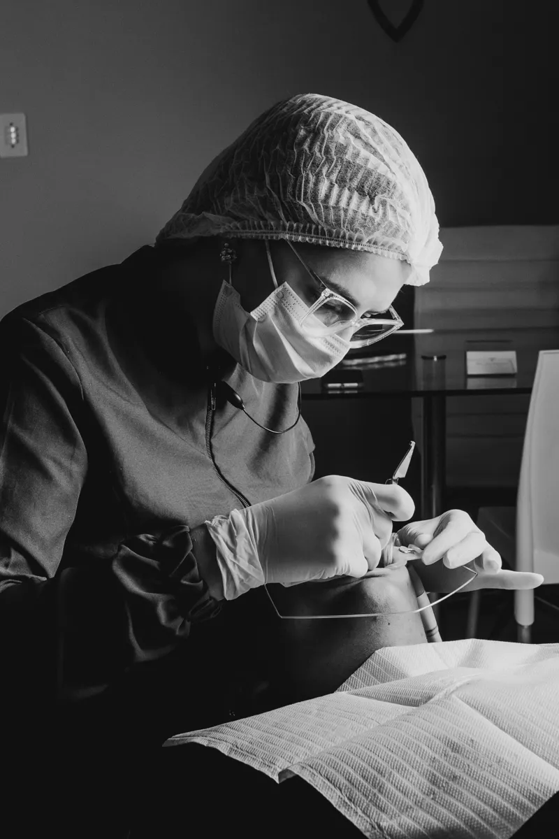 Dentist at work — modern precision, a long way from early dentistry