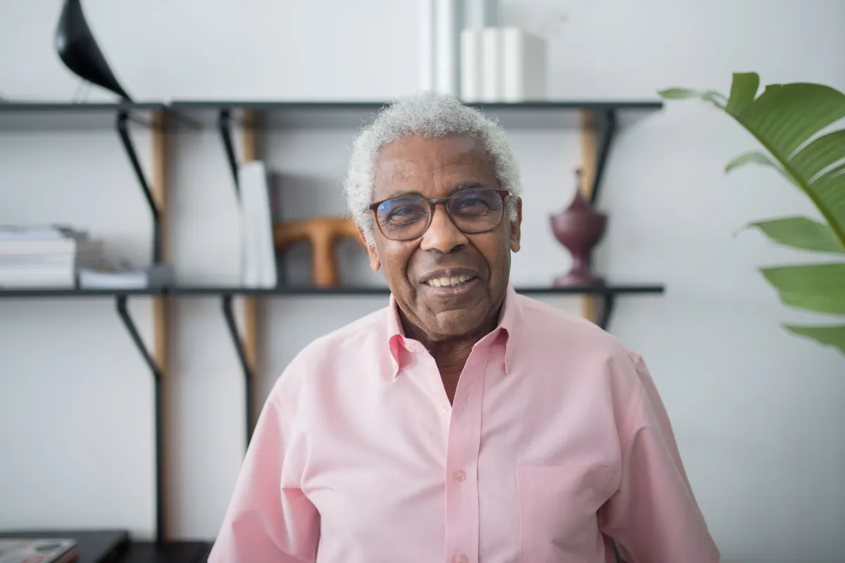 Smiling older man at home — patients told they were not implant candidates deserve a second opinion